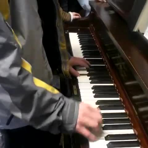 jon v.- playing piano