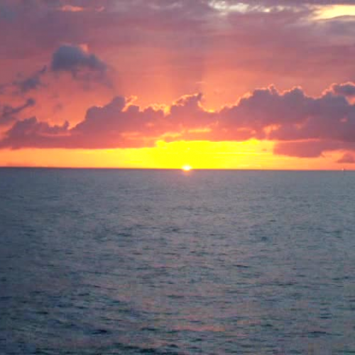 Sun Setting on Horizon