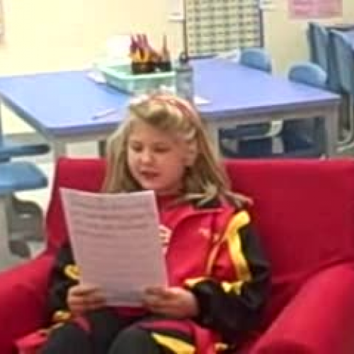 Nicole reads a story that she wrote
