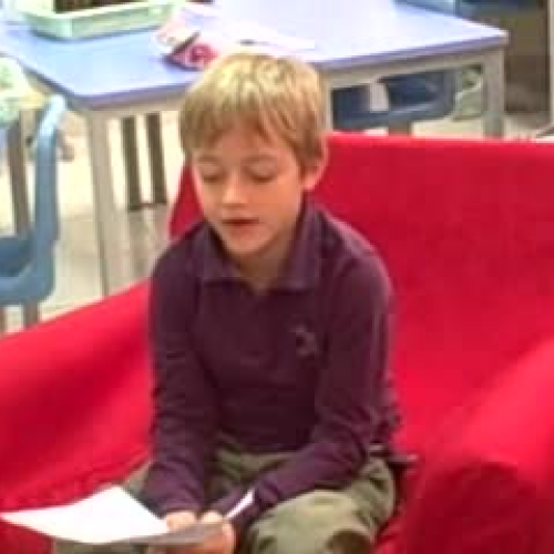 Storm reads a story that he wrote