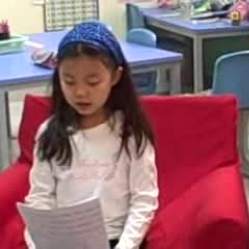Tracy reads a story that she wrote