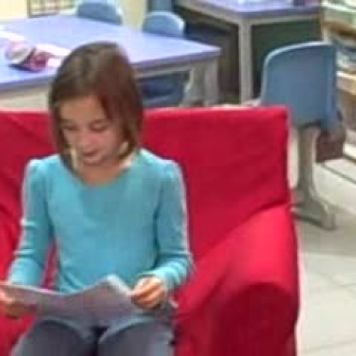 Grace reads a story that she wrote