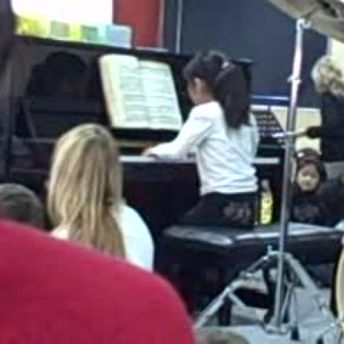 Tracy plays piano solo at Haiti Benefit Conce