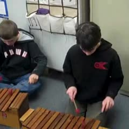 JG Orff Students play Smurf Theme w/ orchestr