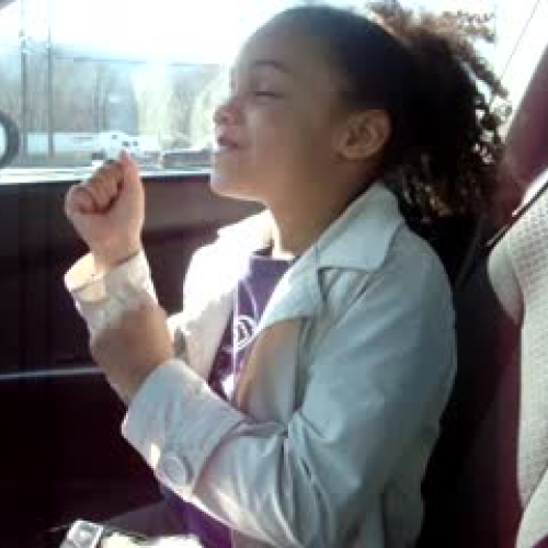 Kayla Dancing in the car :)