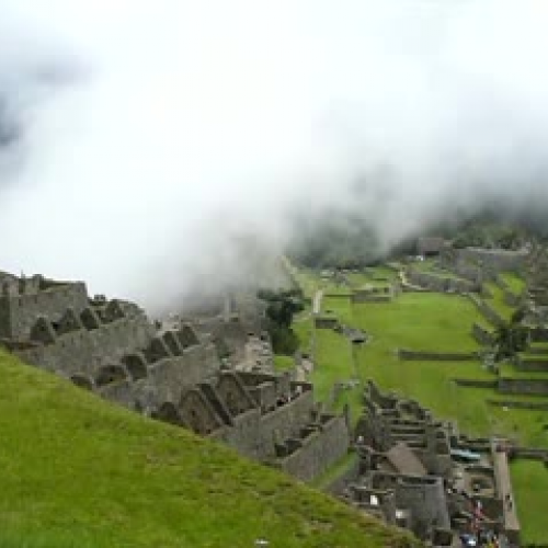 Mist covers Macchu Picchu