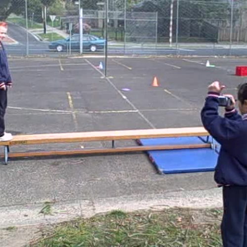 Filming gymnastics practice for feedback