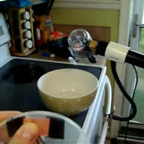 Switch activated pouring cup