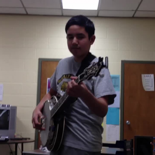 7th grader playing banjo