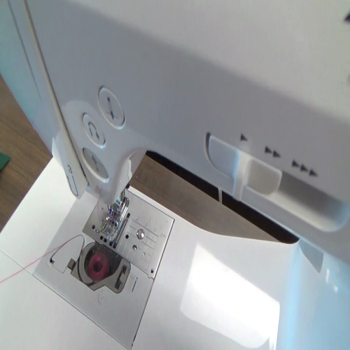Inserting a Bobbin into a Sewing Machine