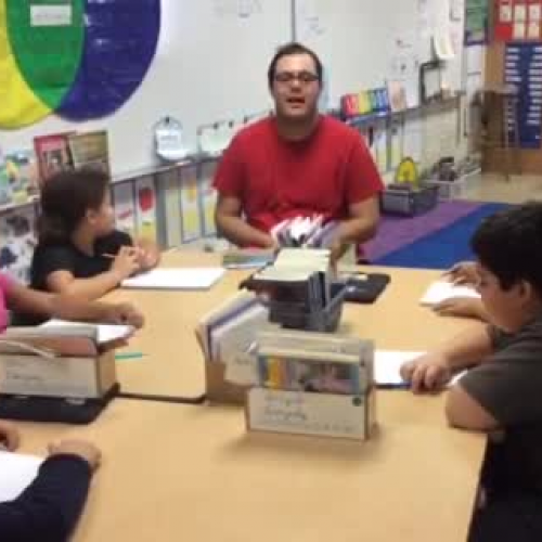 Juan Pena teaching Reading during IWT in Mrs. Hill's class