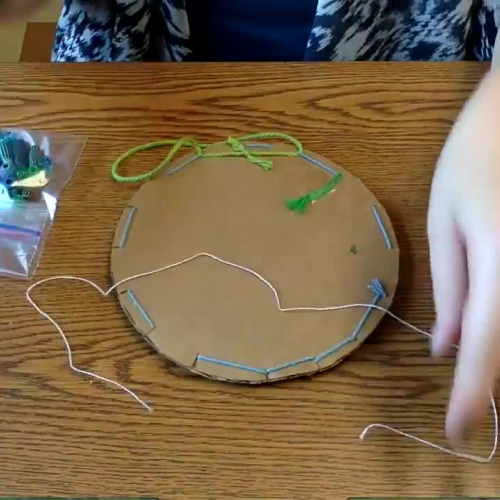 Adding Beads and String to Dream Catcher Weaving