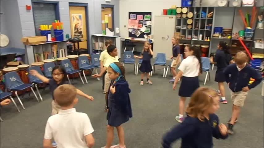 17-18 Ms. Winne's 2nd grade class "Sally Go 'Round the Sun" singing in canon/round